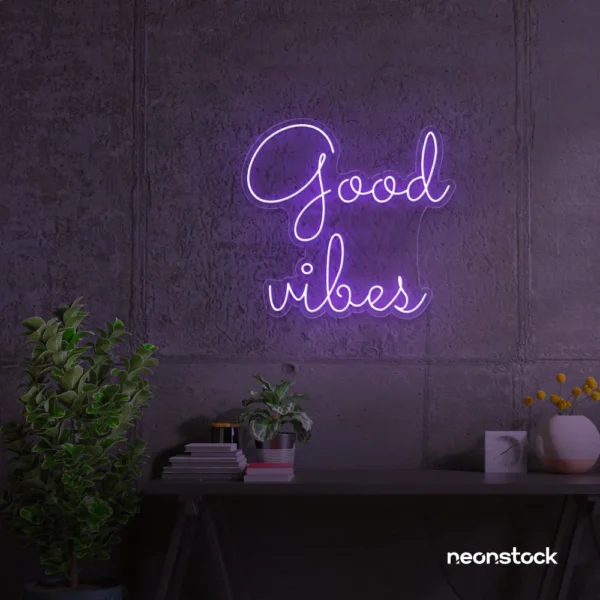 Good Vibes neon sign in purple for positive room decor, dorm walls, and relaxing interiors.