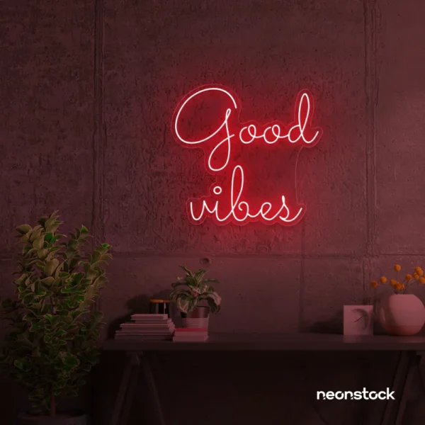 Good Vibes neon sign in red for positive room decor, dorm walls, and relaxing interiors.