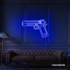 Gun neon sign in dark blue – edgy LED wall decor for modern spaces and game rooms.