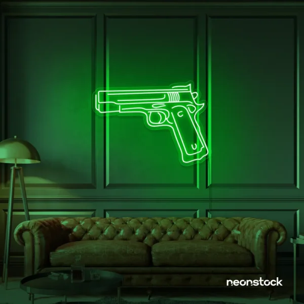 Gun neon sign in deep green – edgy LED wall decor for modern spaces and game rooms.