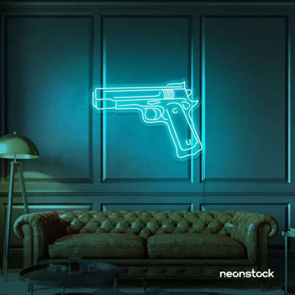 Gun neon sign in mint green – edgy LED wall decor for modern spaces and game rooms.
