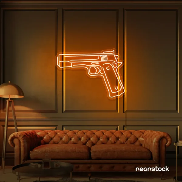 Gun neon sign in orange – edgy LED wall decor for modern spaces and game rooms.