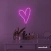 Heart neon sign in pink for beauty salons, home decor, dorm rooms, and Valentine's Day themes.