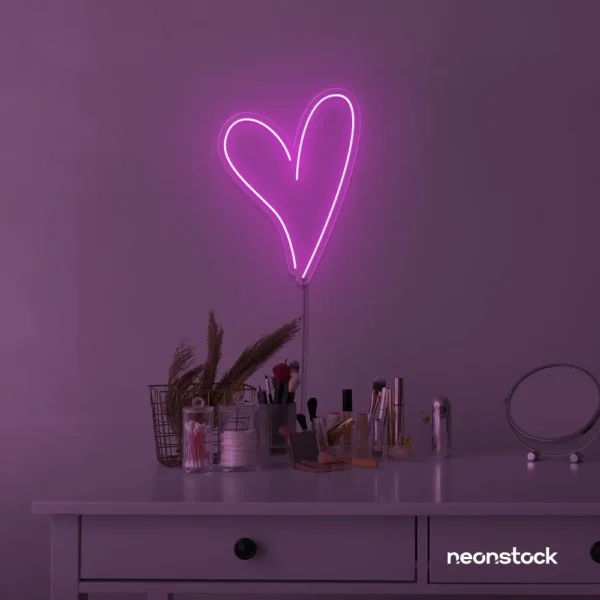 Heart neon sign in pink for beauty salons, home decor, dorm rooms, and Valentine's Day themes.