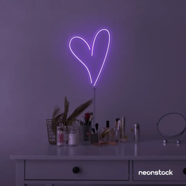 Heart neon sign in purple for beauty salons, home decor, dorm rooms, and Valentine's Day themes.