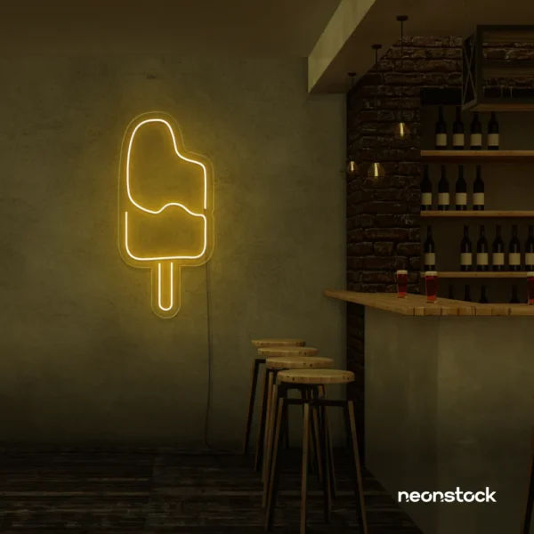 Ice Cream Popsicle neon sign in golden yellow for dessert cafés, ice cream parlors, and playful restaurant decor.