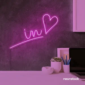 'In Love' neon sign in pink for wedding and Valentine's Day decor