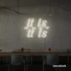 It Is What It Is neon sign in warm white for calm decor, chill rooms, and positive interiors.