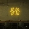 It Is What It Is neon sign in golden yellow for calm decor, chill rooms, and positive interiors.