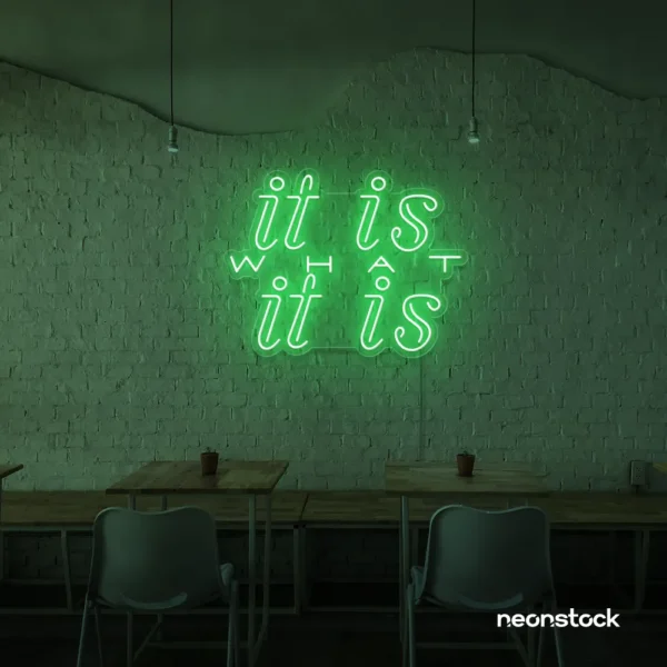 It Is What It Is neon sign in green for calm decor, chill rooms, and positive interiors.