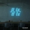 It Is What It Is neon sign in ice blue for calm decor, chill rooms, and positive interiors.