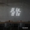 It Is What It Is neon sign in white for calm decor, chill rooms, and positive interiors.