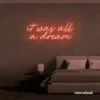It Was All A Dream neon sign in peachy pink for dreamy bedrooms, music rooms, and nostalgic decor.