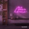 It's So Good To Be Home neon sign in pink for entryways, living rooms, and cozy home decor.