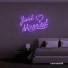 Just Married neon sign in purple for wedding decor, bridal shower, reception backdrop