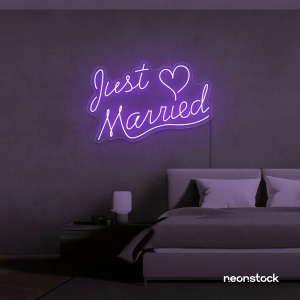 Just Married neon sign in purple for wedding decor, bridal shower, reception backdrop