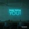 Keep Being You neon sign in mint green for empowerment decor, teen rooms, and creative wall spaces.
