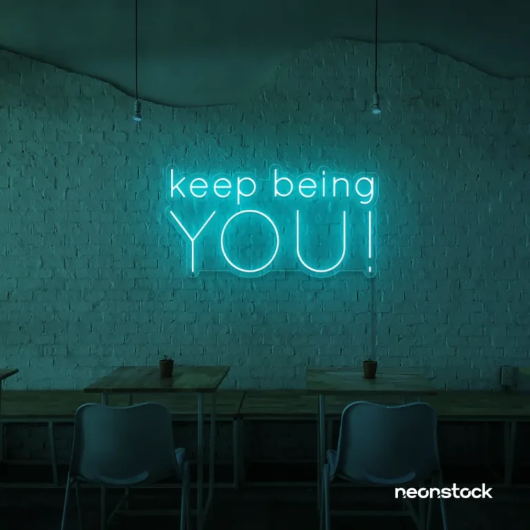 Keep Being You neon sign in mint green for empowerment decor, teen rooms, and creative wall spaces.