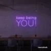 Keep Being You neon sign in purple for empowerment decor, teen rooms, and creative wall spaces.