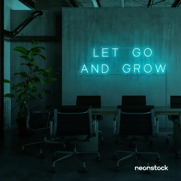 Let Go and Grow neon sign in mint green for growth mindset decor, wellness rooms, and modern inspiration walls.