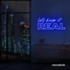 Let's Keep It Real neon sign in dark blue for urban decor, creative rooms, and stylish hangouts.