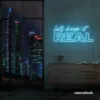 Let's Keep It Real neon sign in ice blue for urban decor, creative rooms, and stylish hangouts.
