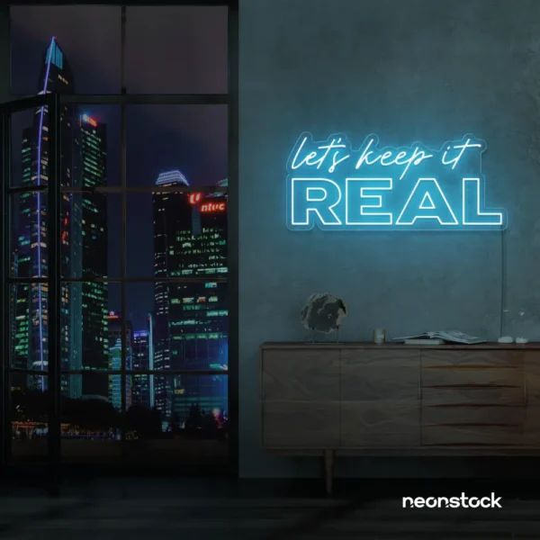 Let's Keep It Real neon sign in ice blue for urban decor, creative rooms, and stylish hangouts.