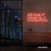 Let's Keep It Real neon sign in peachy pink for urban decor, creative rooms, and stylish hangouts.