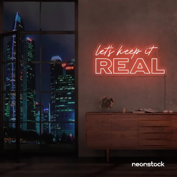 Let's Keep It Real neon sign in peachy pink for urban decor, creative rooms, and stylish hangouts.