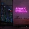 Let's Keep It Real neon sign in pink for urban decor, creative rooms, and stylish hangouts.