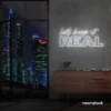 Let's Keep It Real neon sign in white for urban decor, creative rooms, and stylish hangouts.
