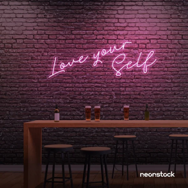 Love Yourself neon sign in baby pink for self-love decor, beauty rooms, and empowering spaces.