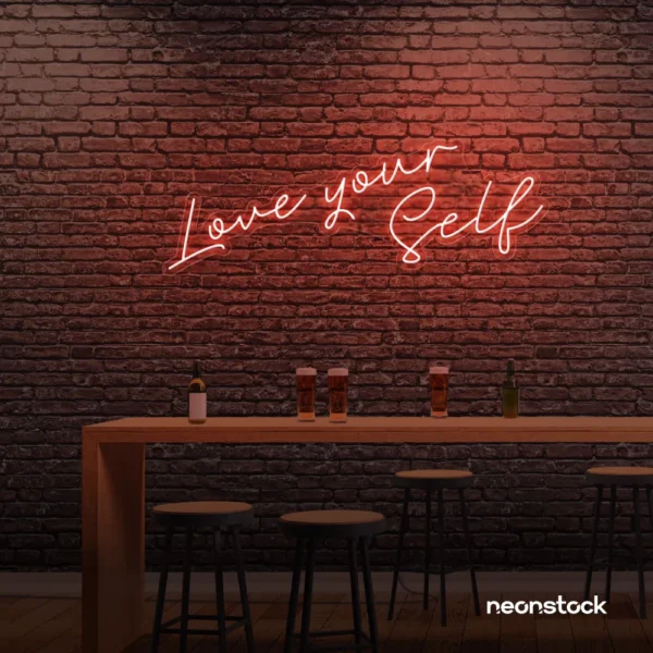Love Yourself neon sign in peachy pink for self-love decor, beauty rooms, and empowering spaces.