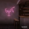 Martini girl neon sign in baby pink for soft, romantic bar decor.