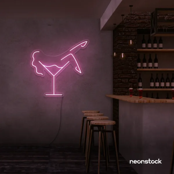 Martini girl neon sign in baby pink for soft, romantic bar decor.