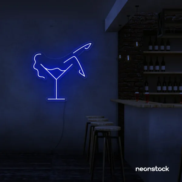 Martini girl neon sign in dark blue for stylish night bar or lounge walls.