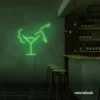 Martini girl neon sign in green for vibrant bar lighting and signage.