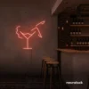 Martini girl neon sign in peachy pink for playful and cozy interiors.