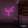 Martini girl neon sign in baby pink for soft, romantic bar decor.