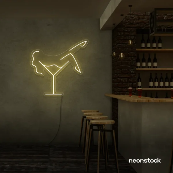Martini girl neon sign in warm white for cozy and vintage-style settings.