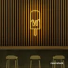 Melting Popsicle neon sign in golden yellow for ice cream parlors, dessert bars, and boba tea shops.