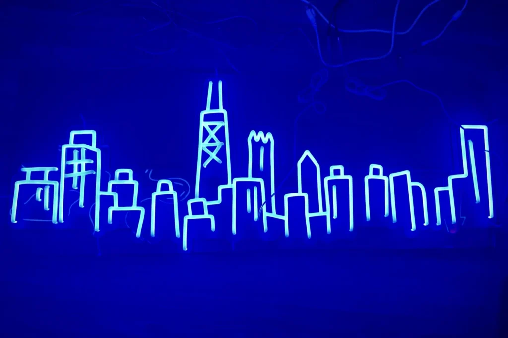 Chicago cityscape neon sign glowing in blue light on dark wall – NeonStock custom design
