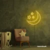 Moon and star neon sign in golden yellow for nurseries, kids' rooms, and dreamy night light decor.