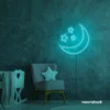 Moon and star neon sign in mint green for nurseries, kids' rooms, and dreamy night light decor.
