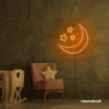 Moon and star neon sign in orange for nurseries, kids' rooms, and dreamy night light decor.