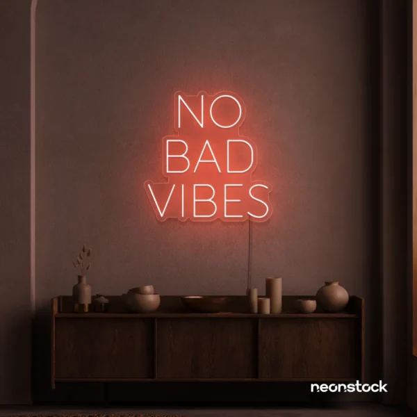 No Bad Vibes neon sign in peachy pink for dorm walls, man caves, and modern mood-boosting decor.