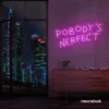 Nobody's Perfect neon sign in pink for humorous decor, vanity setups, and real-life vibes.
