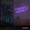 Nobody's Perfect neon sign in purple for humorous decor, vanity setups, and real-life vibes.