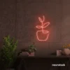 Plant neon sign in peachy pink for home decor