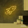 Rocket neon sign in golden yellow for kids' rooms, play areas, and space-themed nursery decor.